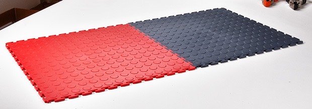 A red and black mat on top of each other.