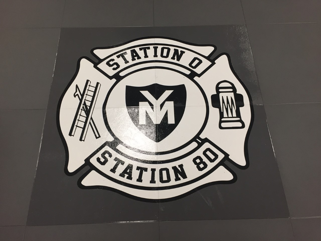 A sticker of the station 8 0 fire department.