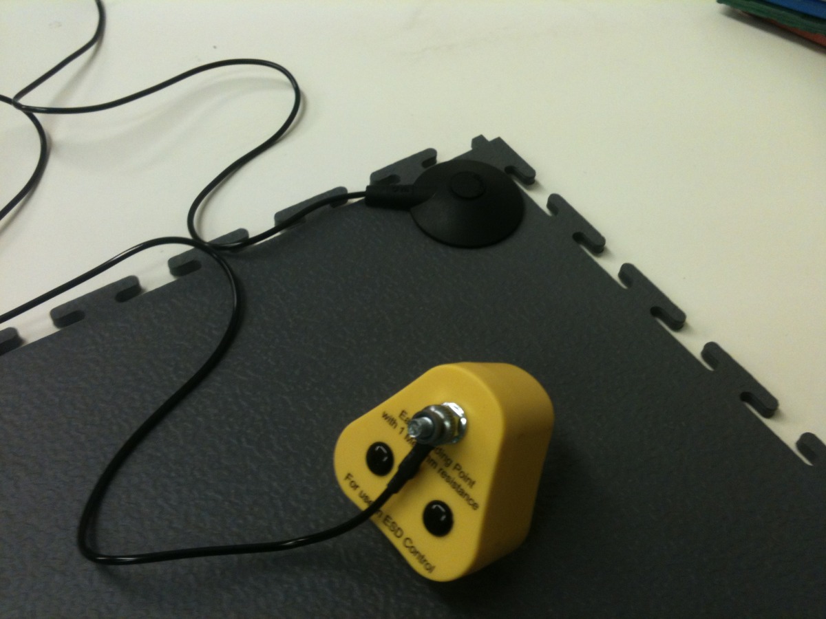 A yellow and black device on top of a table.